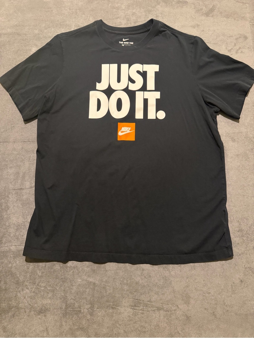 Nike Black Short-Sleeve Tee with White 'JUST DO IT.' and Orange Logo